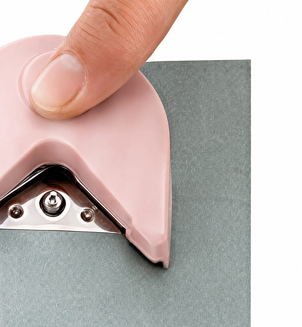 Pressing down on the corner rounder