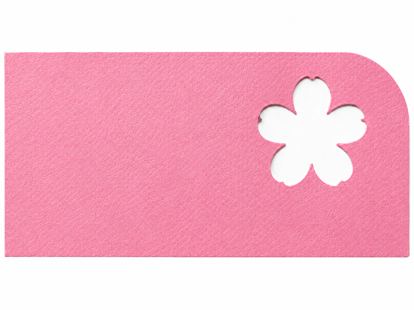 The same paper with a punched flower shape