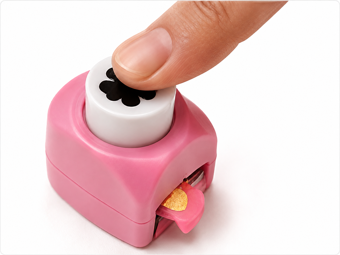 Pressing down on the mini shape punch